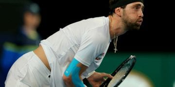 PERTH, AUSTRALIA - JANUARY 08: Nikoloz Basilashvili of Team Georgia follows through from his serve during day six of the 2020 ATP Cup Group Stage at RAC Arena on January 08, 2020 in Perth, Australia. (Photo by James Worsfold/Getty Images)