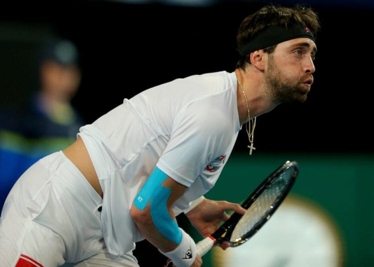 PERTH, AUSTRALIA - JANUARY 08: Nikoloz Basilashvili of Team Georgia follows through from his serve during day six of the 2020 ATP Cup Group Stage at RAC Arena on January 08, 2020 in Perth, Australia. (Photo by James Worsfold/Getty Images)