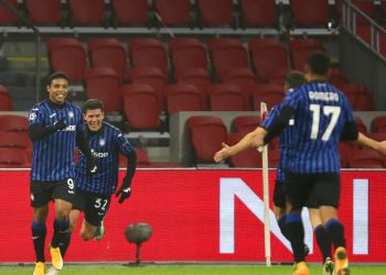 AMSTERDAM, NETHERLANDS - DECEMBER 09: Luis Muriel (L) of Atalanta B.C celebrates with team mate Matteo Pessina after scoring their sides first goal during the UEFA Champions League Group D stage match between Ajax Amsterdam and Atalanta BC at Johan Cruijff Arena on December 09, 2020 in Amsterdam, Netherlands. Sporting stadiums around Natherlands remain under strict restrictions due to the Coronavirus Pandemic as Government social distancing laws prohibit fans inside venues resulting in games being played behind closed doors. (Photo by Dean Mouhtaropoulos/Getty Images)