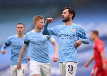 MANCHESTER, ENGLAND - JANUARY 10: Bernardo Silva of Manchester City celebrates after scoring their side's first goal during the FA Cup Third Round match between Manchester City and Birmingham City at Etihad Stadium on January 10, 2021 in Manchester, England. Sporting stadiums around England remain under strict restrictions due to the Coronavirus Pandemic as Government social distancing laws prohibit fans inside venues resulting in games being played behind closed doors. (Photo by Alex Livesey/Getty Images)