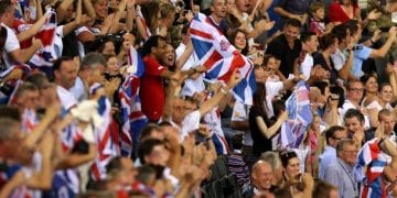 LONDON, ENGLAND - AUGUST 05:  Spectators cheer in the stands as Victoria Pendleton of Great Britain breaks the Olympic record as she competes during the Women's Sprint Track Cycling Qualifying on Day 9 of the London 2012 Olympic Games at Velodrome on August 5, 2012 in London, England.  (Photo by Bryn Lennon/Getty Images)