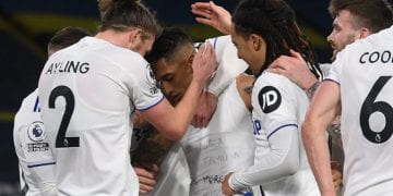 Leeds United's Brazilian midfielder Raphinha Dias Belloli (C) celebrates after he scores his team's third goal during the English Premier League football match between Leeds United and Southampton at Elland Road in Leeds, northern England on February 23, 2021. (Photo by Gareth Copley / POOL / AFP) / RESTRICTED TO EDITORIAL USE. No use with unauthorized audio, video, data, fixture lists, club/league logos or 'live' services. Online in-match use limited to 120 images. An additional 40 images may be used in extra time. No video emulation. Social media in-match use limited to 120 images. An additional 40 images may be used in extra time. No use in betting publications, games or single club/league/player publications. /  (Photo by GARETH COPLEY/POOL/AFP via Getty Images)