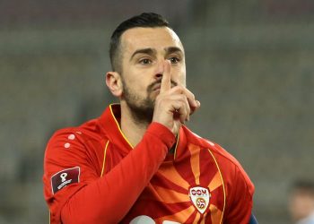 North Macedonia's Ilija Nestorovski celebrates after scoring his side's fifth goal with a penalty kick during the World Cup 2022 group J qualifying soccer match between North Macedonia and Liechtenstein at the National Arena Todor Proeski stadium in Skopje, North Macedonia, Sunday March 28, 2021. (AP Photo/Boris Grdanoski)