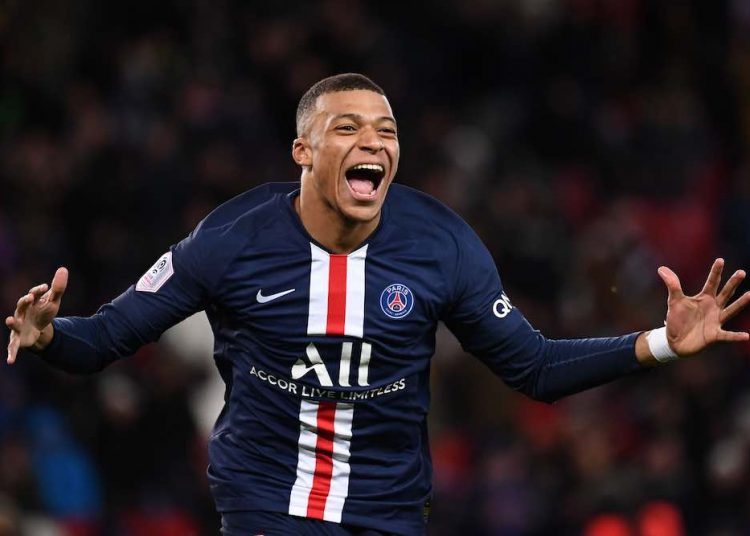TOPSHOT - Paris Saint-Germain's French forward Kylian Mbappe celebrates after scoring a goal during the French L1 football match between Paris Saint-Germain (PSG) and Dijon, on February 29, 2020 at the Parc des Princes stadium in Paris. (Photo by FRANCK FIFE / AFP) (Photo by FRANCK FIFE/AFP via Getty Images)