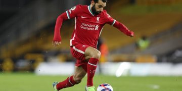 WOLVERHAMPTON, ENGLAND - MARCH 15: Mohamed Salah of Liverpool during the Premier League match between Wolverhampton Wanderers and Liverpool at Molineux on March 15, 2021 in Wolverhampton, United Kingdom. Sporting stadiums around the UK remain under strict restrictions due to the Coronavirus Pandemic as Government social distancing laws prohibit fans inside venues resulting in games being played behind closed doors. (Photo by Matthew Ashton - AMA/Getty Images)