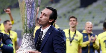 Villarreal's Spanish coach Unai Emery kisses the trophy after his team won the UEFA Europa League final football match between Villarreal CF and Manchester United at the Gdansk Stadium in Gdansk on May 26, 2021. (Photo by KACPER PEMPEL / POOL / AFP) (Photo by KACPER PEMPEL/POOL/AFP via Getty Images)