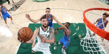 MILWAUKEE, WI - OCTOBER 10: Sandro Mamukelashvili #54 of the Milwaukee Bucks shoots the ball against the Oklahoma City Thunder during a preseason game on October 10, 2021 at the Fiserv Forum Center in Milwaukee, Wisconsin. NOTE TO USER: User expressly acknowledges and agrees that, by downloading and or using this Photograph, user is consenting to the terms and conditions of the Getty Images License Agreement. Mandatory Copyright Notice: Copyright 2021 NBAE (Photo by Gary Dineen/NBAE via Getty Images).